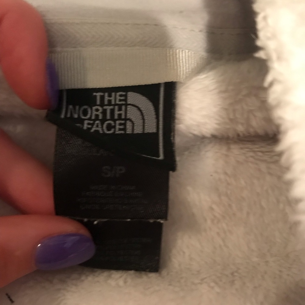 Small white North Face jacket